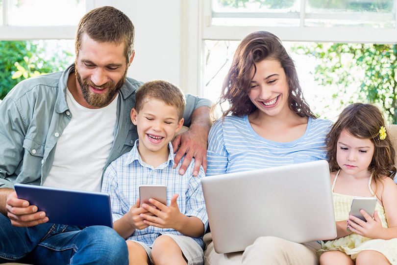 Families using broadband and devices at home.